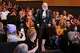 Jek Cunningham is introduced before a screening of the cult comedy “So I Married an Axe Murderer,” at the Balboa Theater in San Francisco in 2023. Cunningham appears in the movie as a bagpiper.