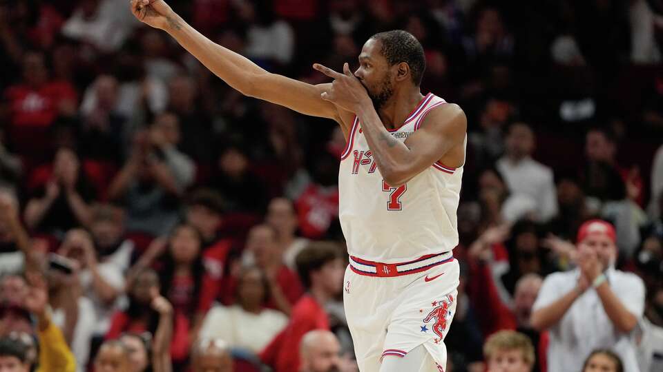 Houston Rockets forward Kevin Durant (7) reacts to sinking a three-pointer against the Philadelphia 76ers at the Toyota Center in Houston on Thursday, April 9, 2026. Houston Rockets won the game 113-102.