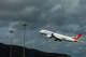 A Turkish Airlines plane takes off at San Francisco International Airport on Friday. The airport was experiencing weather-related delays Saturday.