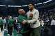 Milwaukee Bucks head coach Doc Rivers, center left, and Giannis Antetokounmpo, center right, embrace before an NBA basketball game against the Brooklyn Nets, Friday, April 10, 2026, in Milwaukee.