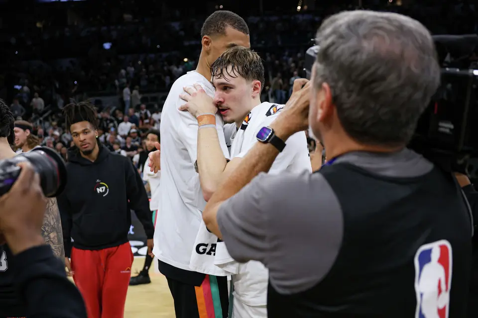 San Antonio Spurs forward Victor Wembanyama (1) and Dallas Mavericks forward Cooper Flagg (32) talk after playing each other at Frost Bank Center in San Antonio, Friday, April 10, 2026. The Spurs won 139-120.