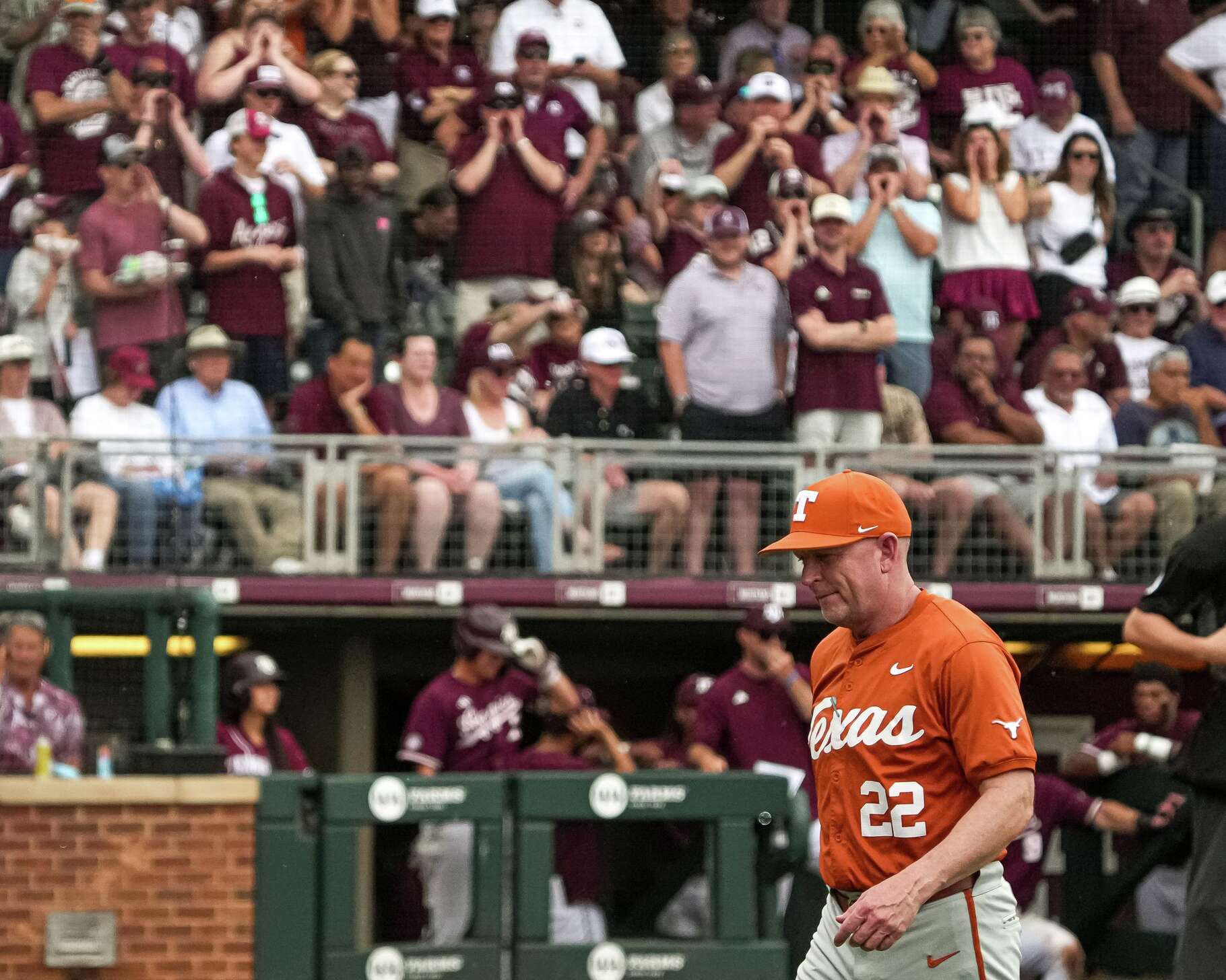 Texas Longhorns head coach Jim Schlossnagle walks to the dugout during the Lone Star Showdown against Texas A&M at Blue Bell Park on Saturday, April 11, 2026 in College Station, Texas.