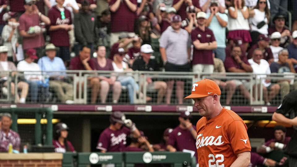 Texas Longhorns head coach Jim Schlossnagle walks to the dugout during the Lone Star Showdown against Texas A&M at Blue Bell Park on Saturday, April 11, 2026 in College Station, Texas.