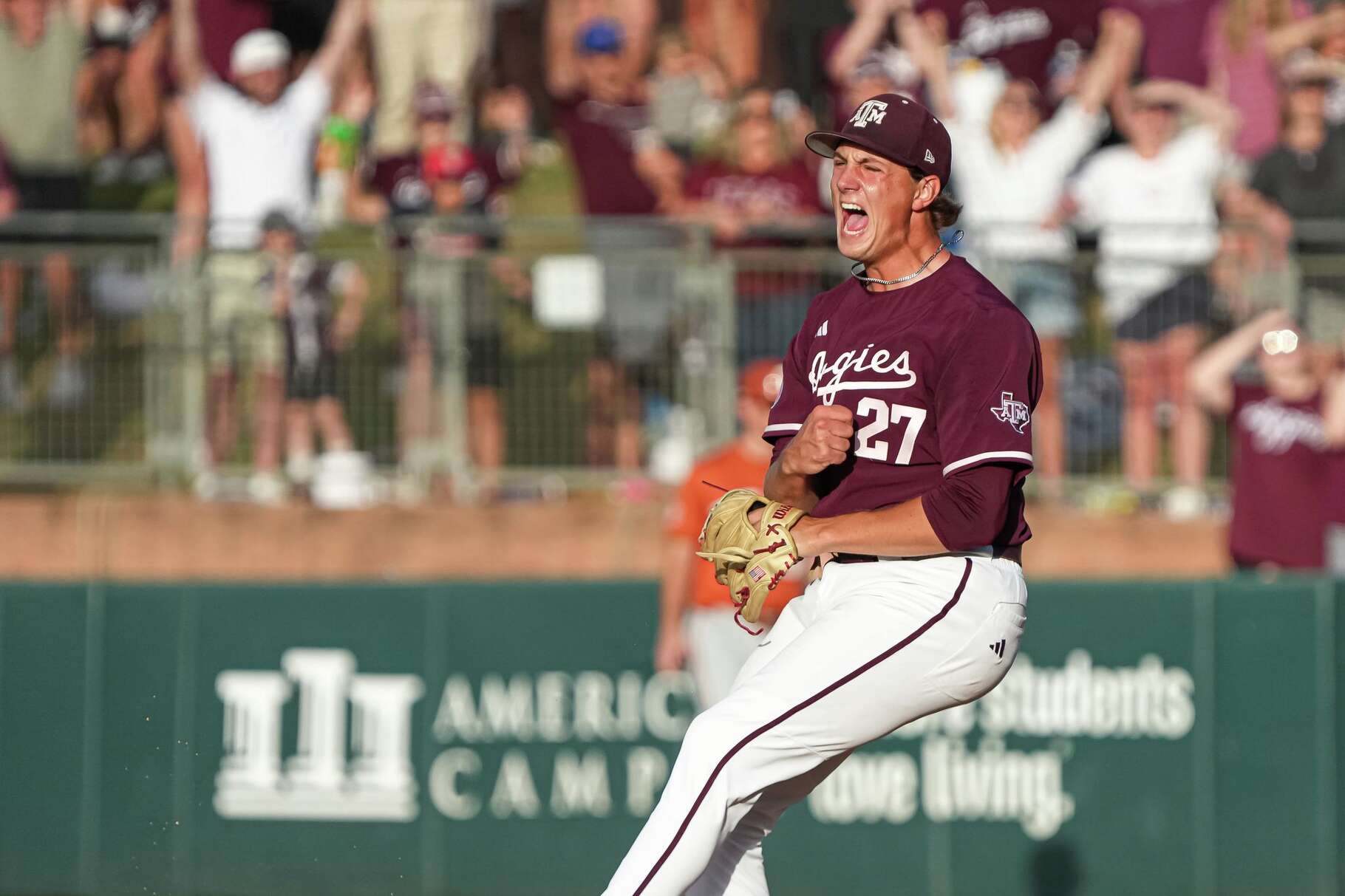 Texas A&M pitcher Gavin Lyons (27) celebrates a final strikeout to win the Lone Star Showdown against Texas at Blue Bell Park on Saturday, April 11, 2026 in College Station, Texas.