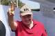 Rafael López Aliaga, presidential candidate of the Popular Renovation party, makes the victory gesture at a polling station during the general elections held in Lima, Peru, Sunday, April 12, 2026. (AP Photo/Guadalupe Pardo)