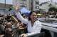 Keiko Fujimori, presidential candidate of the Fuerza Popular party, waves after voting in the general elections held in Lima, Peru, Sunday, April 12, 2026. (AP Photo/Gerardo Marín)