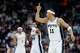San Antonio Spurs forward Carter Bryant (11) signals to his teammates during the third quarter against the Denver Nuggets at Frost Bank Center in San Antonio, Sunday, April 12, 2026. The Spurs lost 128-118 to the Nuggets in their final regular-season game.