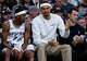 San Antonio Spurs guard De'aaron Fox (4) and forward Victor Wembanyama (1) talk on the bench during the first quarter against the Denver Nuggets at Frost Bank Center in San Antonio, Sunday, April 12, 2026. The Spurs lost 128-118 to the Nuggets in their final regular-season game.