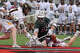 Guilford's Aidan Connelly (22) and Hand's John Healy (21) got for the ball during a scrum during the Class M boys lacrosse final at Fairfield University on Saturday, June 14, 2025.