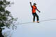FILE: Dean Potter walks on a 41-meter-long and two-centimeter-wide slackline over Enshi Grand Canyon at an altitude of 1,800m on April 22, 2012 in Enshi, Hubei Province of China.