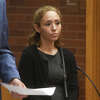 Kristen Hogan stands during a hearing in state Superior Court in Danbury, Conn. April 16, 2026.