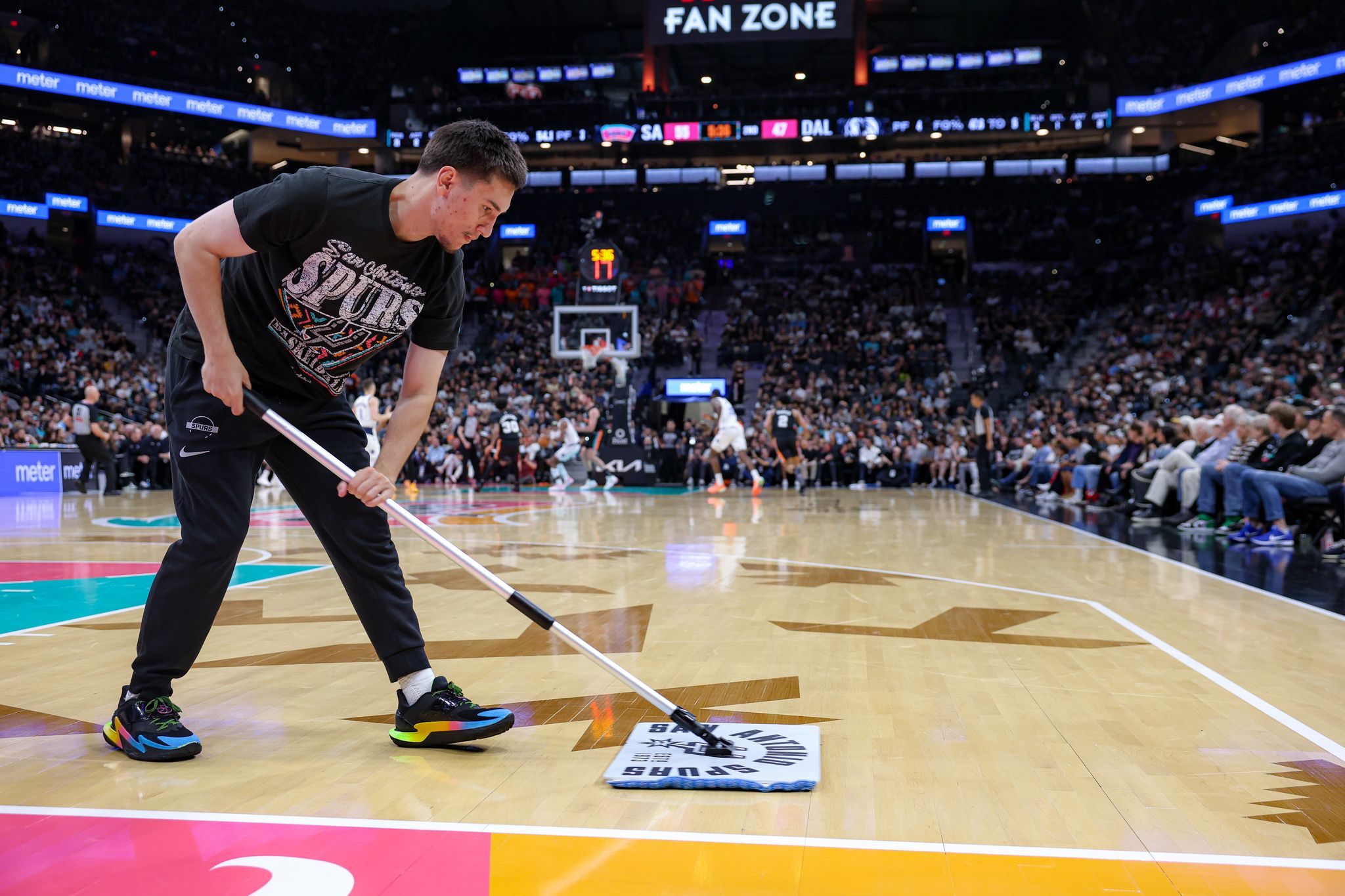What Spurs' team attendants do during games at Frost Bank Center