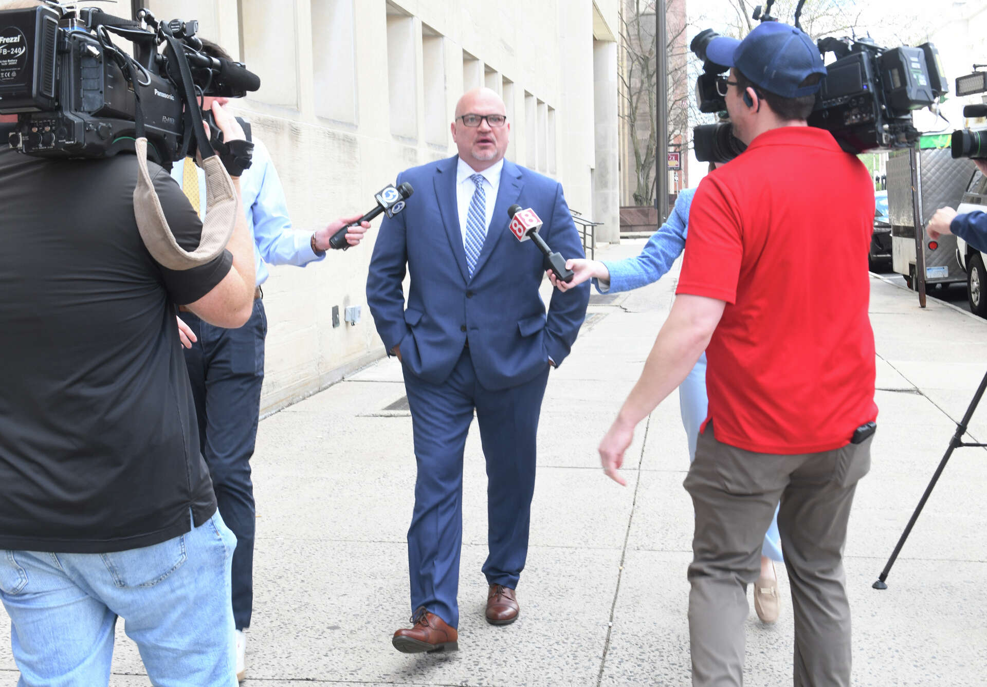 Former New Haven police chief accused of embezzling pleads not guilty
