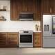 Samsung appliances refridgerator, range and microwave in a modern kitchen,