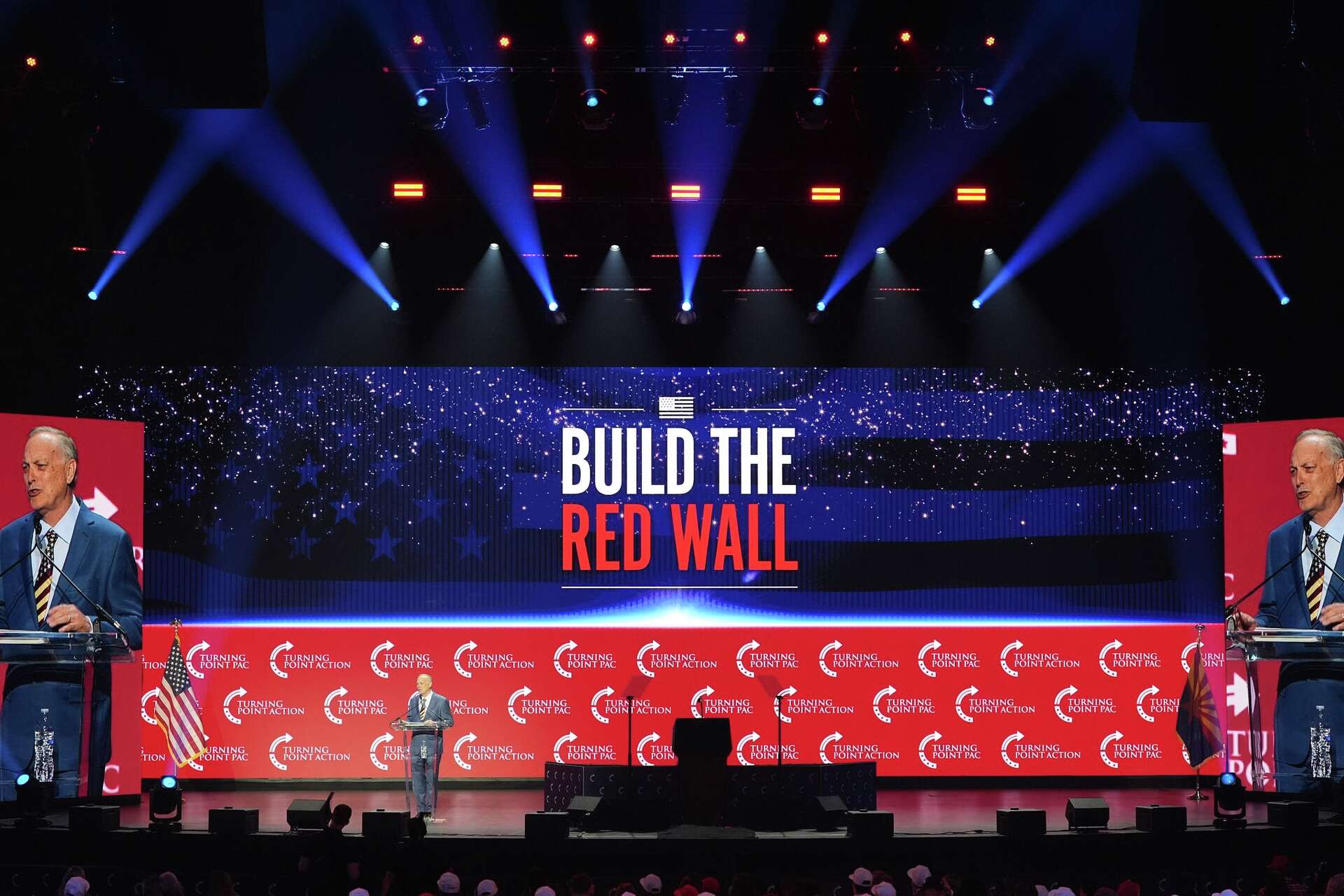 Wall Rally Photos show the 'Build the Red Wall' rally in Arizona, headlined by Trump