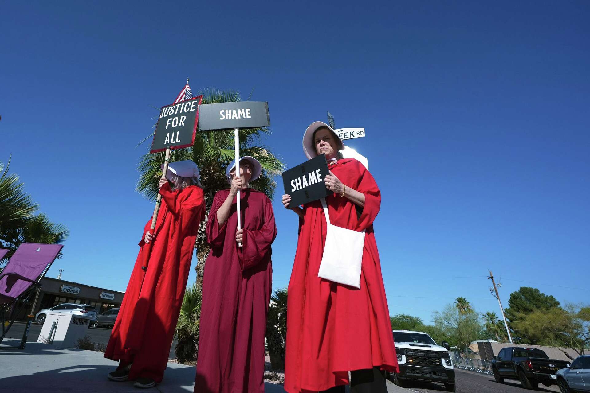 Wall Rally Photos show the 'Build the Red Wall' rally in Arizona, headlined by Trump