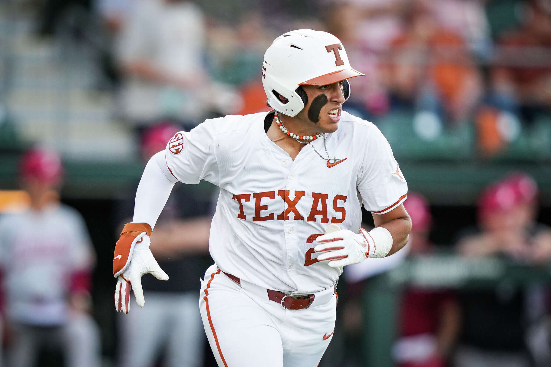 Texas Longhorns infielder Adrian Rodriguez (24) takes off to run to first in the first inning as the Texas Longhorns play their first game of a three-game series against the Alabama Crimson Tide, April 17, 2026.