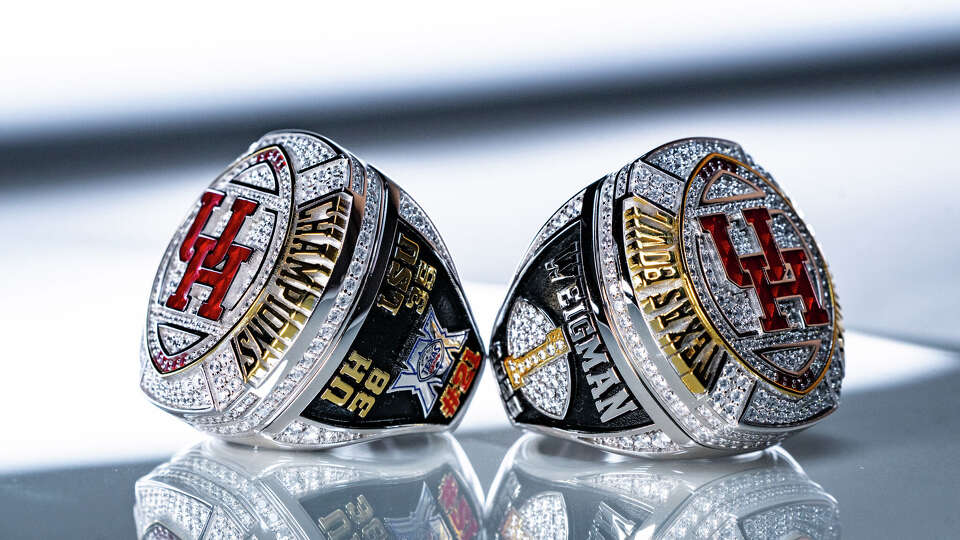 UH's Texas Bowl rings that include the score of the win over LSU and player's names and number.