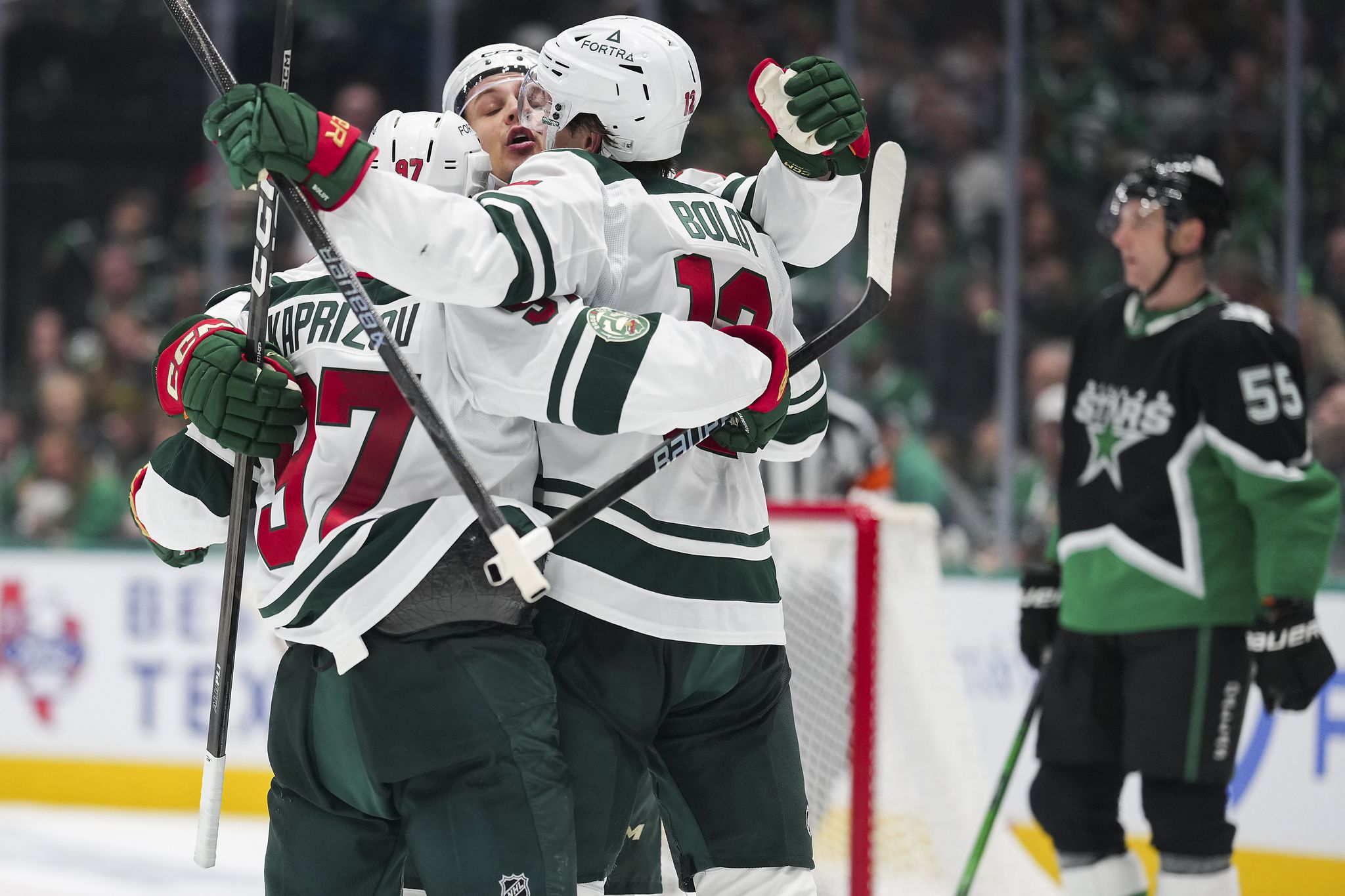 Minnesota Wild Players Celebrate Goal Against Dallas Stars