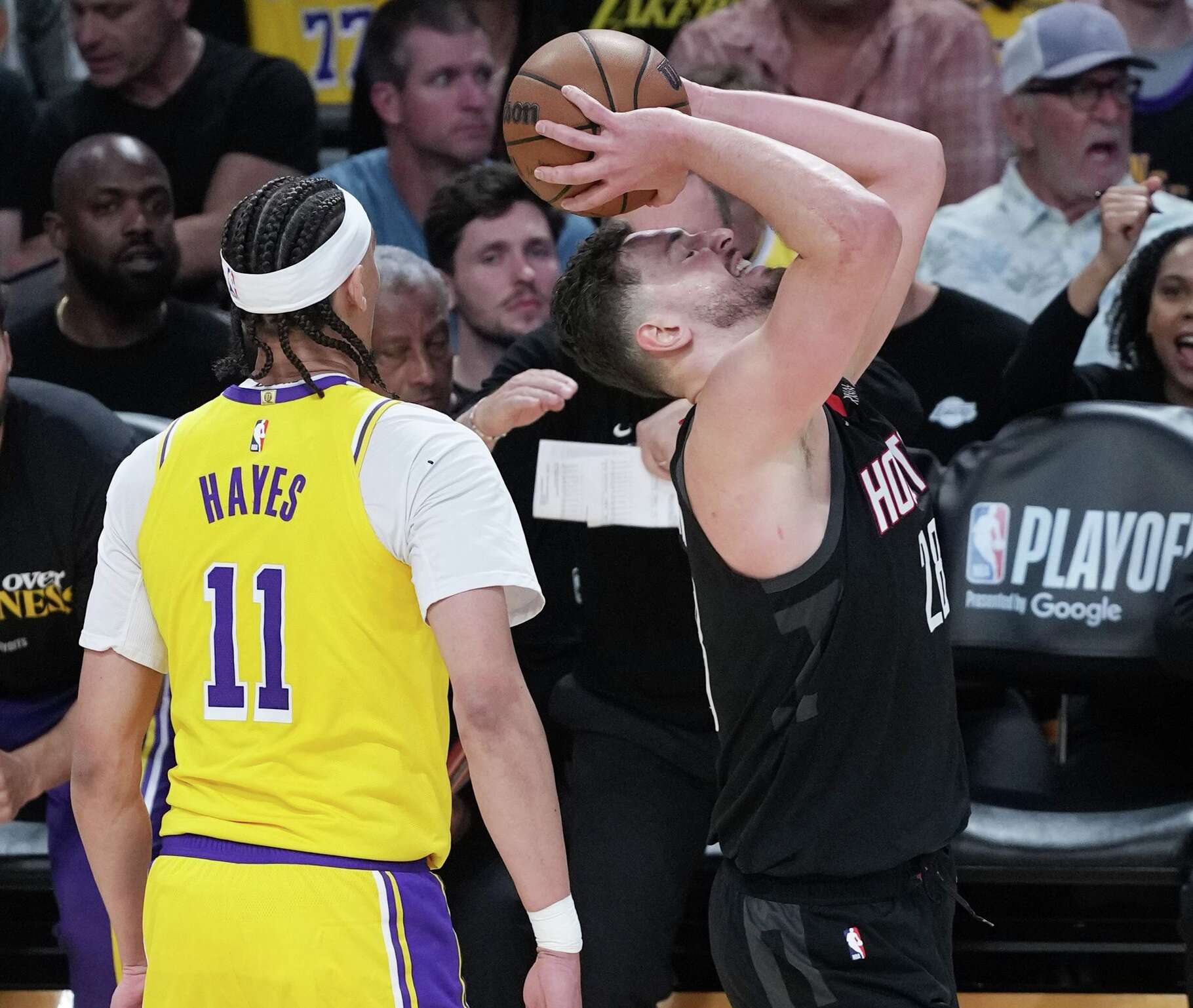 Houston Rockets center Alperen Sengun (28) reacts to being called for traveling during the first round of the Western Conference playoffs against the Los Angeles Lakers at Crypto.com Arena in Los Angeles on Saturday, April 18, 2026.