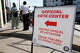 An official vote center sign is seen at Oak Lawn Branch Library on the first day of early voting in the state's primary, Tuesday, Feb. 17, 2026, in Dallas.