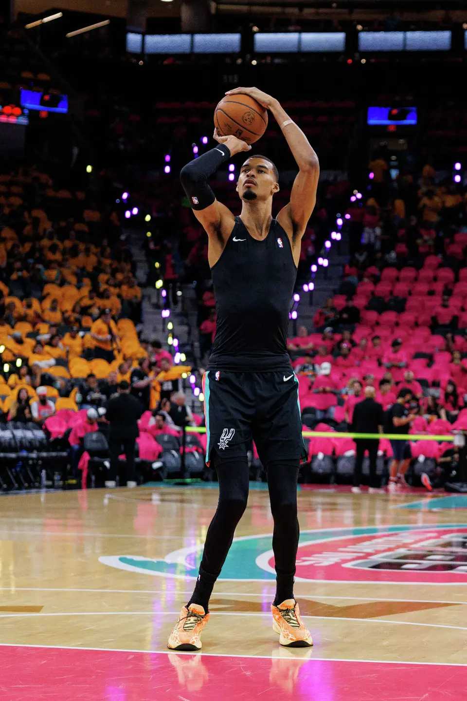San Antonio Spurs forward Victor Wembanyama warms up before the start of Game 1 of a first-round NBA playoff series against the Portland Trail Blazers at Frost Bank Center, Sunday, April 19, 2026, in San Antonio.