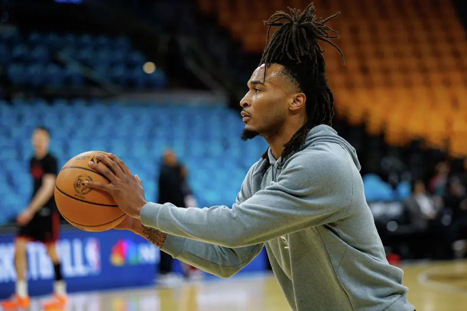 San Antonio Spurs guard Stephon Castle warms up on the court before the start of Game 1 of a first-round NBA playoff series against the Portland Trail Blazers at Frost Bank Center, Sunday, April 19, 2026, in San Antonio.