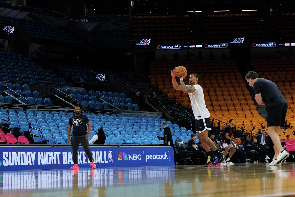 San Antonio Spurs guard Dylan Harper, center, warms up on the court with his teammates before the start of Game 1 of a first-round NBA playoff series against the Portland Trail Blazers at Frost Bank Center, Sunday, April 19, 2026, in San Antonio.