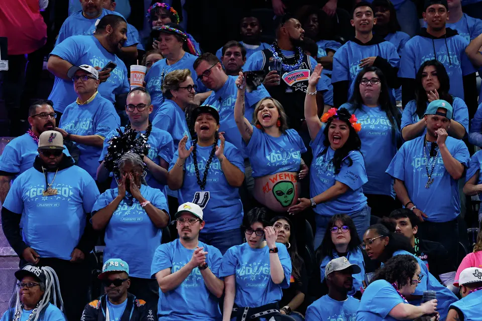 San Antonio Spurs fans cheer during the first half of Game 1 of a first-round NBA playoff series against the Portland Trail Blazers at Frost Bank Center, Sunday, April 19, 2026, in San Antonio.