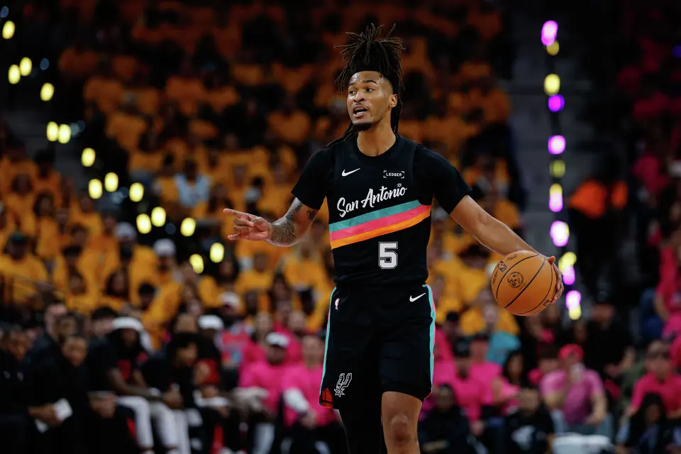 San Antonio Spurs guard Stephon Castle (5) directs his teammates during the first half of Game 1 of a first-round NBA playoff series against the Portland Trail Blazers at Frost Bank Center, Sunday, April 19, 2026, in San Antonio.