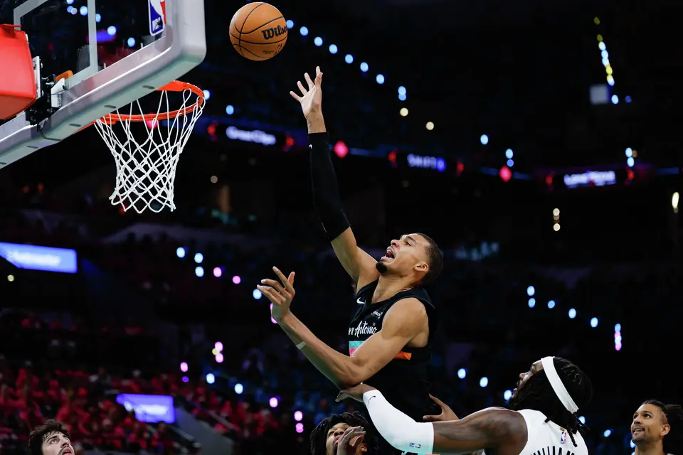 San Antonio Spurs forward Victor Wembanyama (1) goes up for a shot during the first half of Game 1 of a first-round NBA playoff series against the Portland Trail Blazers at Frost Bank Center, Sunday, April 19, 2026, in San Antonio.