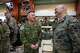 Japan army Maj. Gen. Toshikatsu Musha, left, talks with a U.S. marines after the opening ceremonies of the joint military exercise dubbed "Balikatan" or "Shoulder to Shoulder," Monday, April 20, 2026, in Quezon city, Philippines.