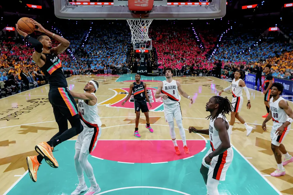 San Antonio Spurs forward Victor Wembanyama (1) goes up for a shot over Portland Trail Blazers forward Toumani Camara (33) during the second half of Game 1 of a first-round NBA playoff series at Frost Bank Center, Sunday, April 19, 2026, in San Antonio. The Spurs won 111-98.