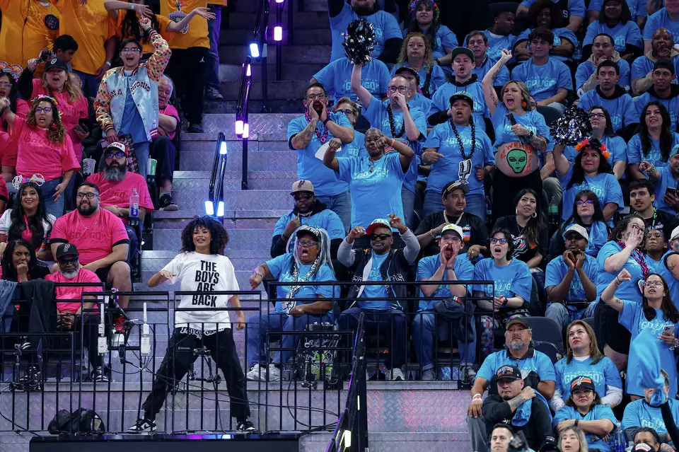 San Antonio Spurs fans wear fiesta-themed playoff t-shirts as they cheer on the Spurs during the first half of Game 1 of a first-round NBA playoff series against the Portland Trail Blazers at Frost Bank Center, Sunday, April 19, 2026, in San Antonio.