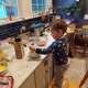 Rebecca Kaplan, an APNN and primary care provider with Hartford HealthCare, models healthy eating habits by encouraging her children, including her daughter Esti Kaplan, to help with planning meals.