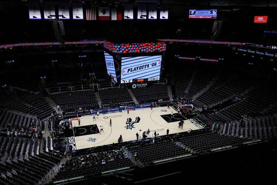 Players from the San Antonio Spurs and the Portland Trail Blazers warm up on the court before game 2 of a first-round NBA playoff series at Frost Bank Center in San Antonio, Tuesday, April 21, 2026. A black-out was planned for San Antonio Spurs fans with free t-shirts waiting on their seats.