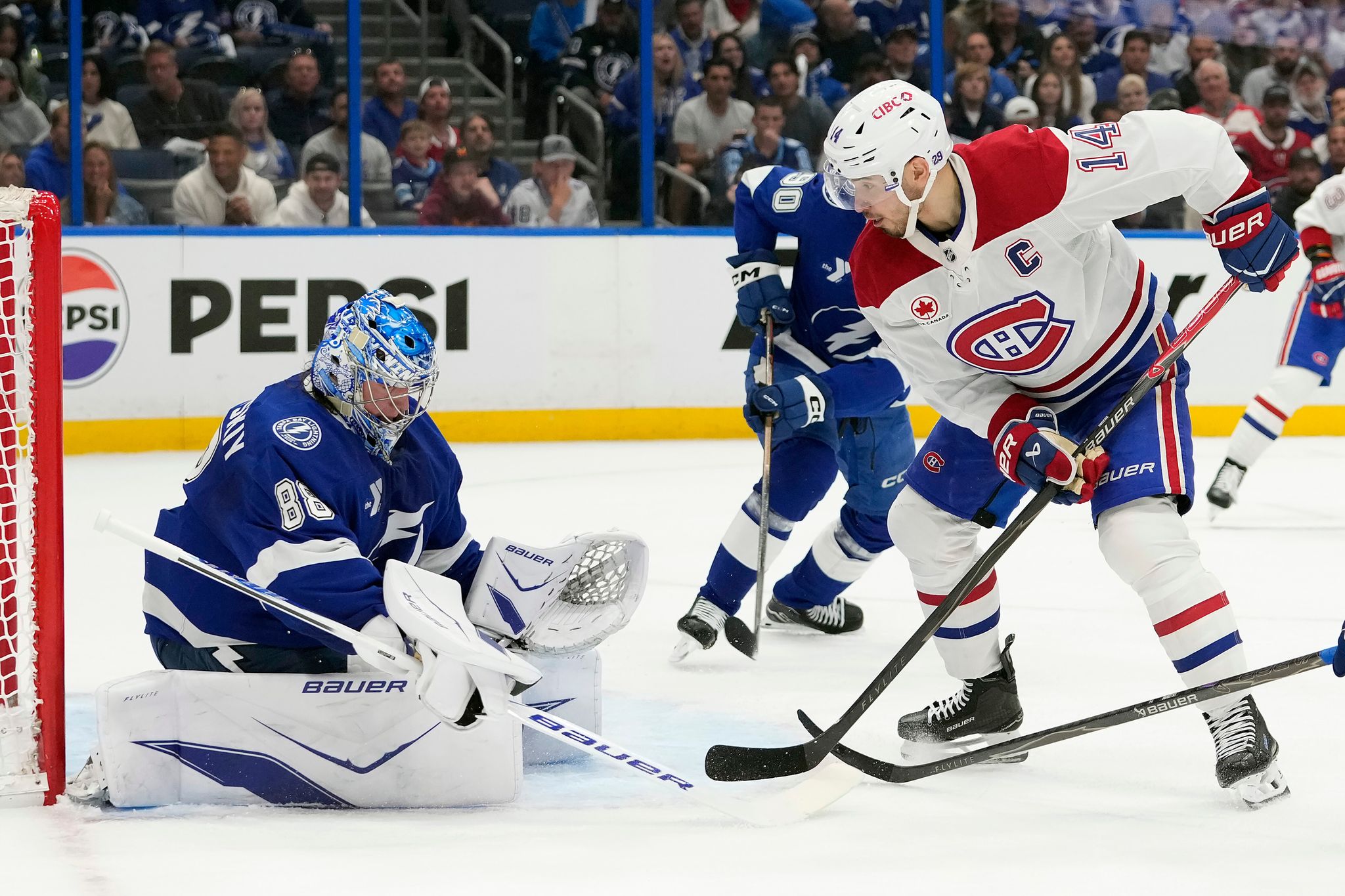 Moser scores in OT as Lightning beat Canadiens 3-2 in Game 2 and tie first-round series Bongo Cross|word Typeshift SpellTower Really Bad Chess Pile-Up Poker