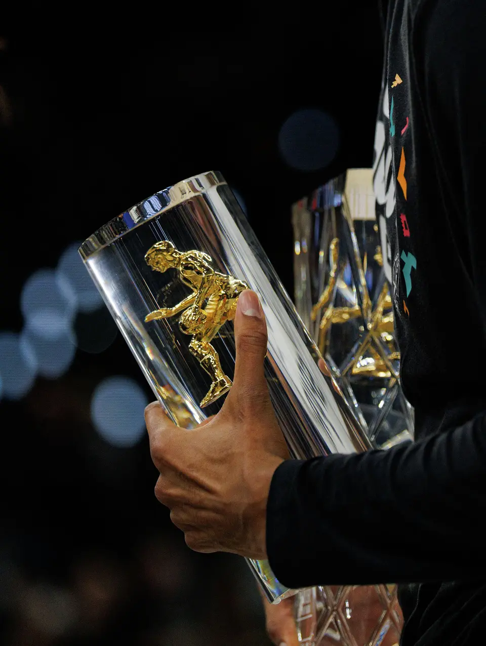 San Antonio Spurs forward Victor Wembanyama holds his NBA Defensive Player of the Year trophy before Game 2 of a first-round NBA playoffs basketball series in San Antonio, Tuesday, April 21, 2026
