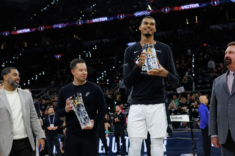 San Antonio Spurs forward Victor Wembanyama holds his NBA Defensive Player of the Year trophy before Game 2 of a first-round NBA playoffs basketball series in San Antonio, Tuesday, April 21, 2026