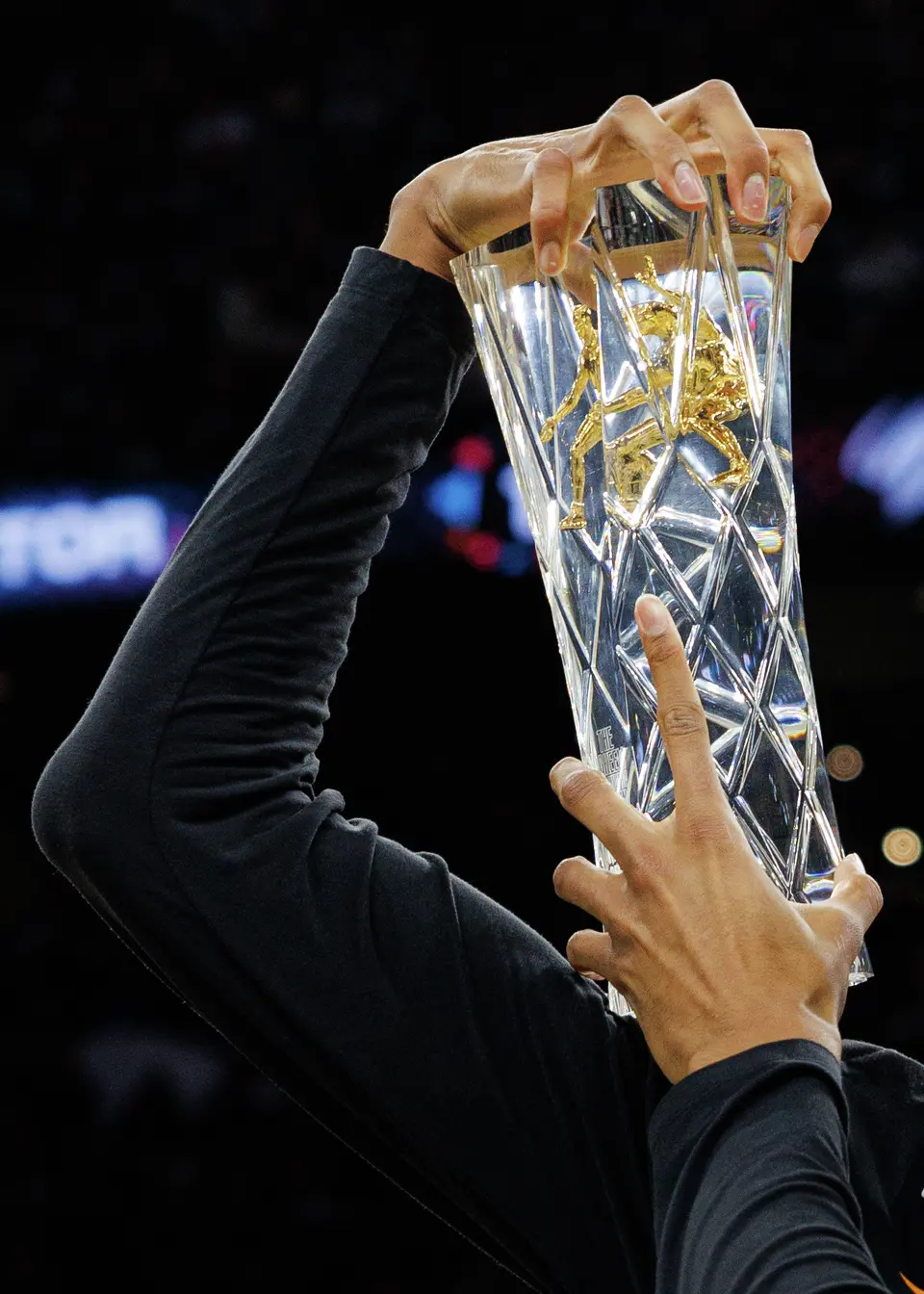 San Antonio Spurs forward Victor Wembanyama holds his NBA Defensive Player of the Year trophy before Game 2 of a first-round NBA playoffs basketball series in San Antonio, Tuesday, April 21, 2026
