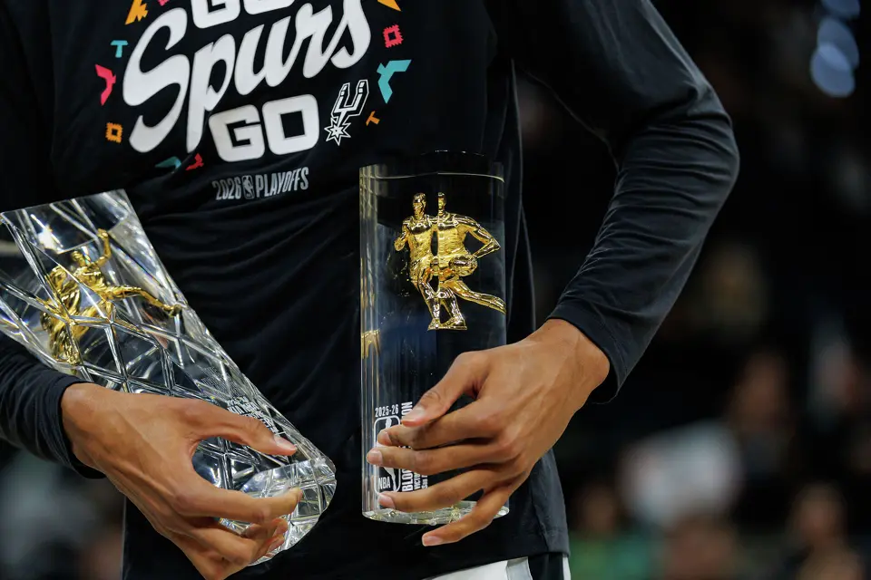 San Antonio Spurs forward Victor Wembanyama holds his NBA Defensive Player of the Year trophy before Game 2 of a first-round NBA playoffs basketball series in San Antonio, Tuesday, April 21, 2026