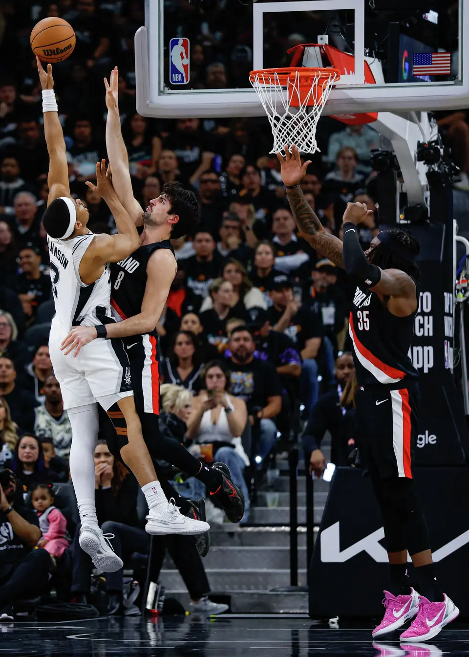 San Antonio Spurs forward Keldon Johnson (3) shoots over Portland Trail Blazers forward Deni Avdija (8) during the second half of Game 2 of a first-round NBA playoff series at Frost Bank Center in San Antonio, Tuesday, April 21, 2026. The Spurs fell 106-103, evening the series at 1-1.