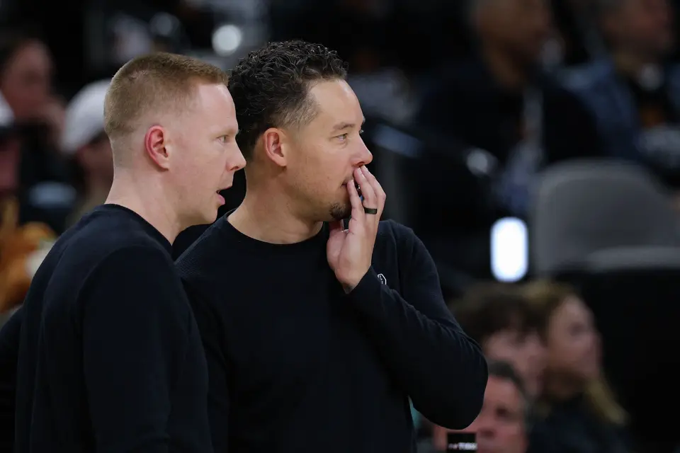 San Antonio Spurs associate head coach Sean Sweeney talks to head coach Mitch Johnson during the second half of Game 2 of a first-round NBA playoff series against the Portland Trail Blazers at Frost Bank Center in San Antonio, Tuesday, April 21, 2026. The Spurs fell 106-103, evening the series at 1-1.
