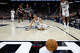 San Antonio Spurs forward Carter Bryant (11) reacts as the referees call for the Portland Trail Blazers to receive the ball during the first half of Game 2 of a first-round NBA playoff at Frost Bank Center in San Antonio, Tuesday, April 21, 2026.