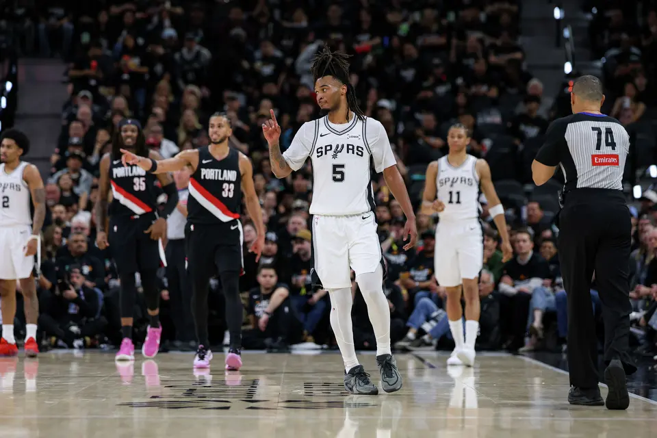 San Antonio Spurs guard Stephon Castle (5) signals to his teammates during the second half of Game 2 of a first-round NBA playoff series against the Portland Trail Blazers at Frost Bank Center in San Antonio, Tuesday, April 21, 2026. The Spurs fell 106-103, evening the series at 1-1.