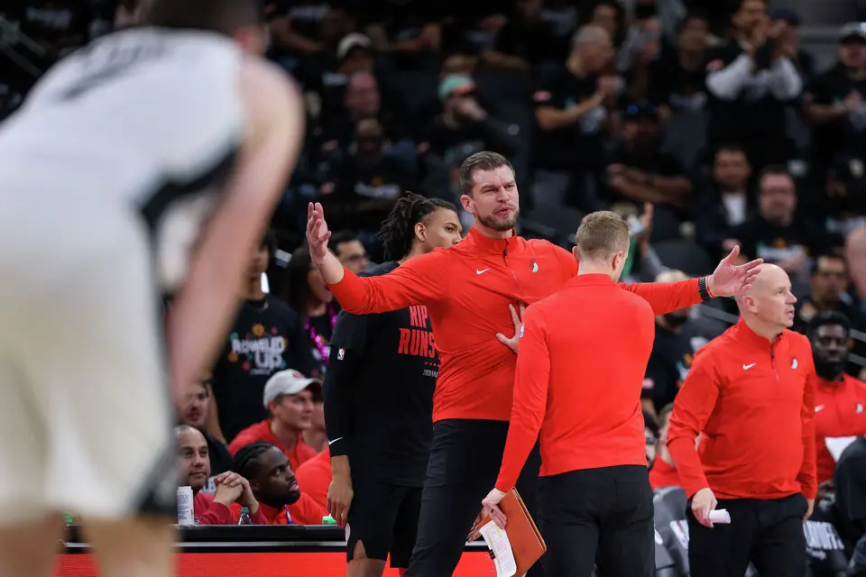 Portland Trail Blazers interim head coach Tiago Splitter reacts after receiving a technical foul during the second half of Game 2 of a first-round NBA playoff series at Frost Bank Center in San Antonio, Tuesday, April 21, 2026. The Spurs fell 106-103, evening the series at 1-1.