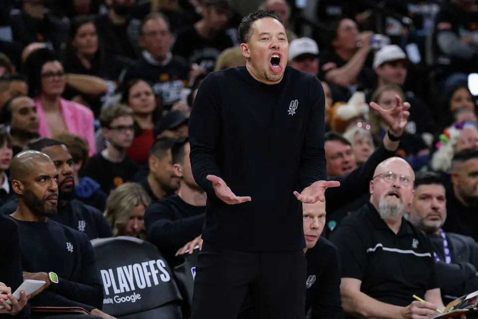 San Antonio Spurs head coach Mitch Johnson reacts to a call from referees during the second half of Game 2 of a first-round NBA playoff series against the Portland Trail Blazers at Frost Bank Center in San Antonio, Tuesday, April 21, 2026. The Spurs fell 106-103, evening the series at 1-1.