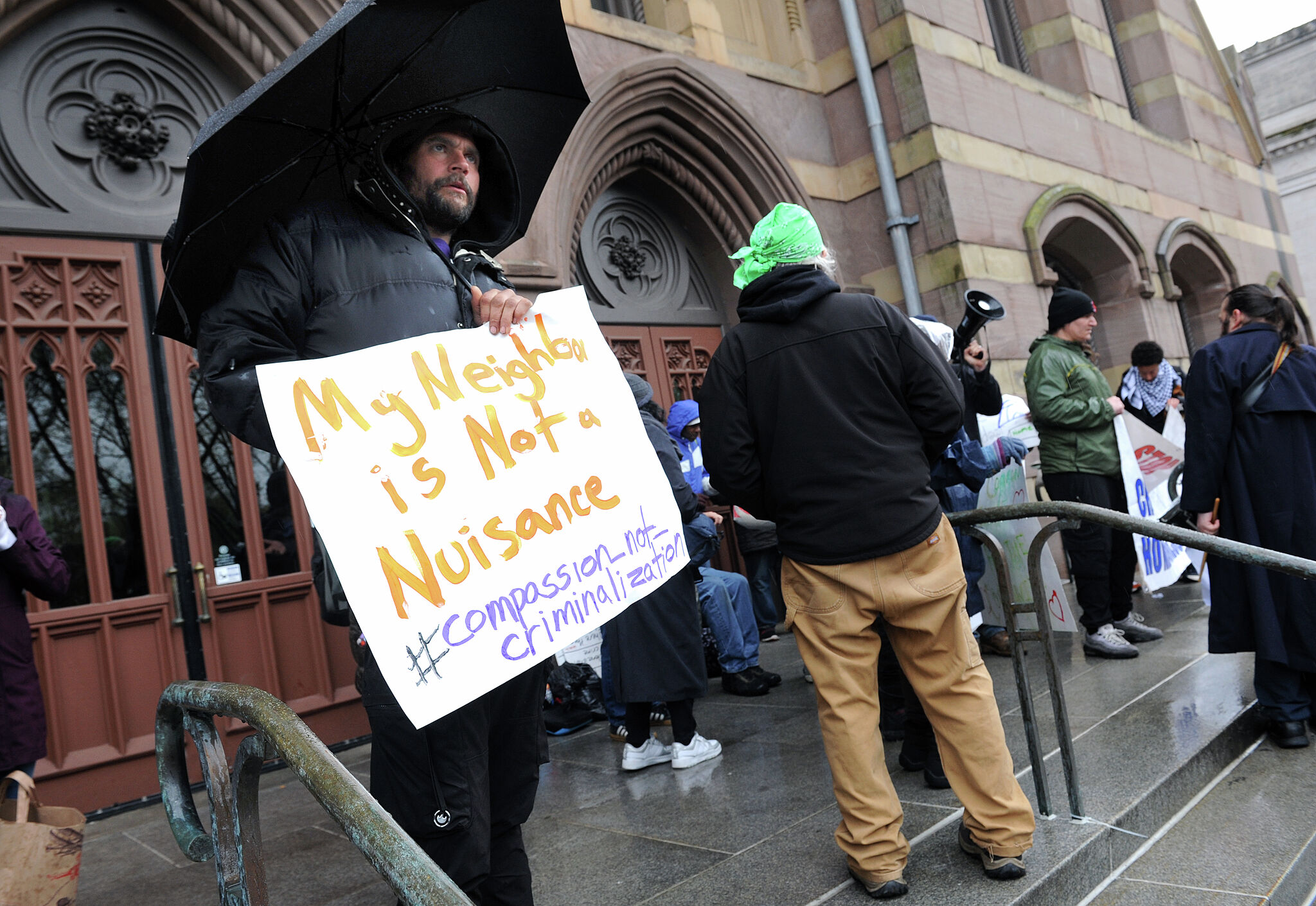 As New Haven warming centers close, unhoused activists rally for resources