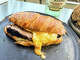 Chavo's cowboy croissant with brisket, egg and cheese at Chavo's BBQ at Third Place