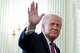 President Donald Trump waves as he departs after an event for NCAA national champions in the State Dining Room of the White House, Tuesday, April 21, 2026, in Washington.